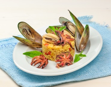 Ризотто с моллюсками ананасом и мятой